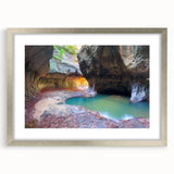 Textured art depicting abstract Zion landscape in muted earth tones on a framed silver mat, suitable for bedroom decor.