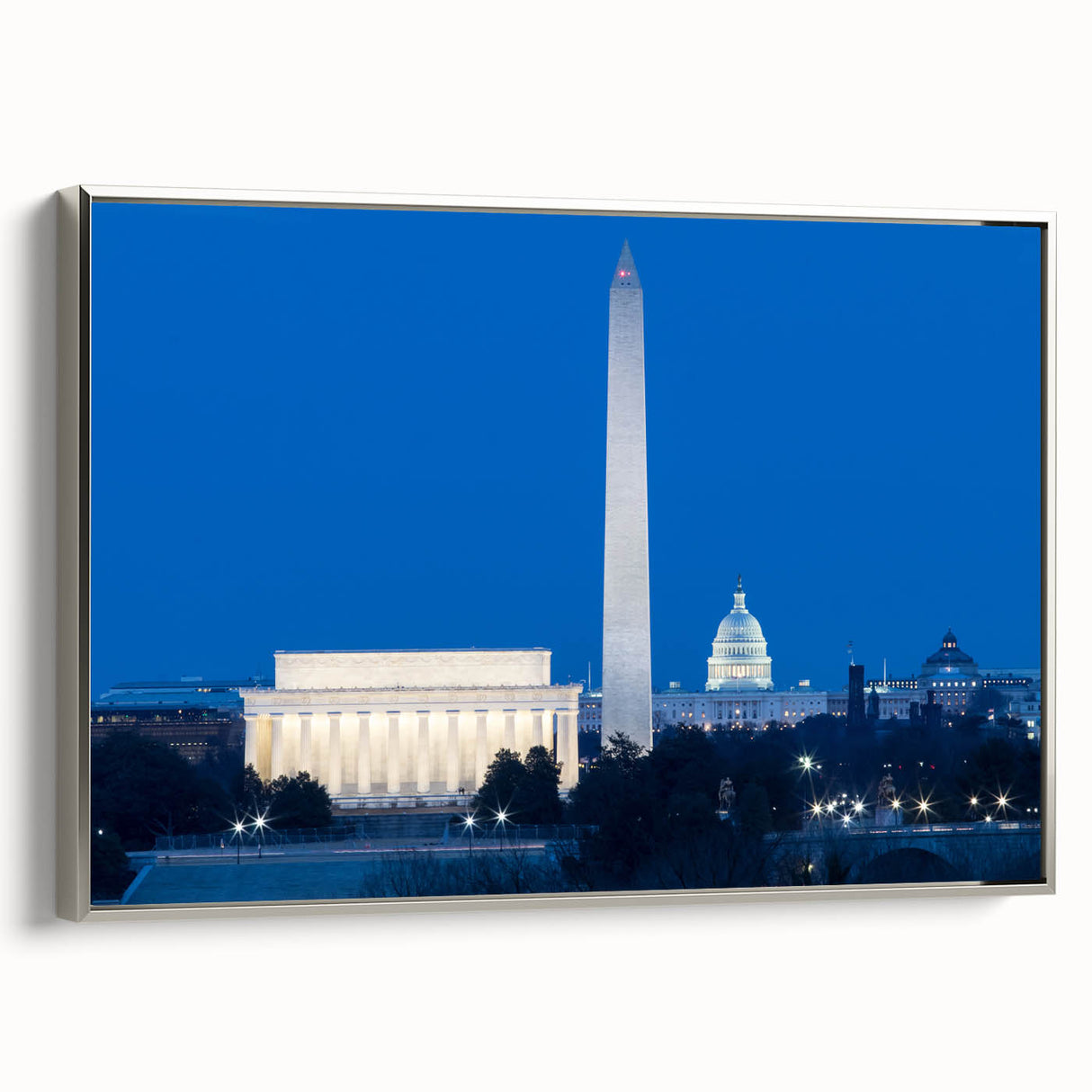 Framed canvas of Washington D.C. monuments in black with colorful accents, ideal for office decor.