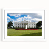 Abstract art print of the White House in muted gray and blue tones, framed with a white mat.