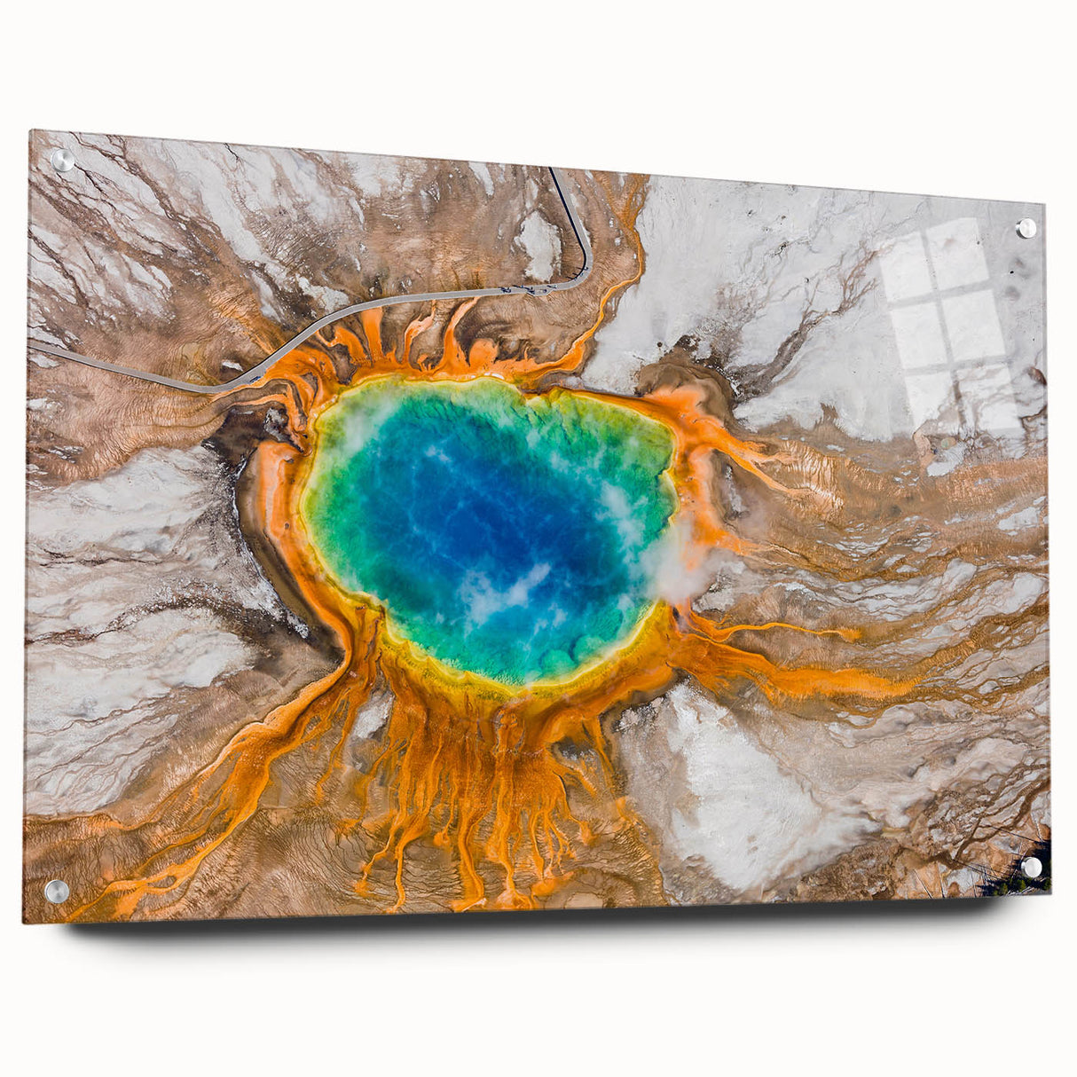 Abstract depiction of Yellowstone scenery on large acrylic glass, with vibrant earth tones.