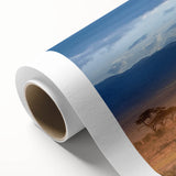 Art deco poster of African scenery on rolled canvas, with earthy tones, ideal for nursery wall art or dining room.