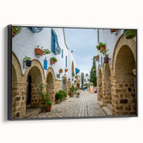 Black and white framed canvas of a Tunisian landscape, ideal for bedroom wall decor.