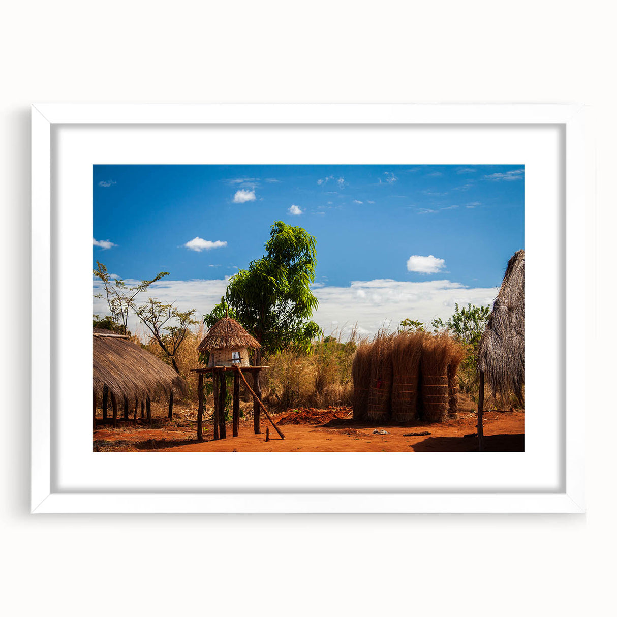 Abstract art print depicting the African Zambia scenery in muted earth tones on a framed white mat.