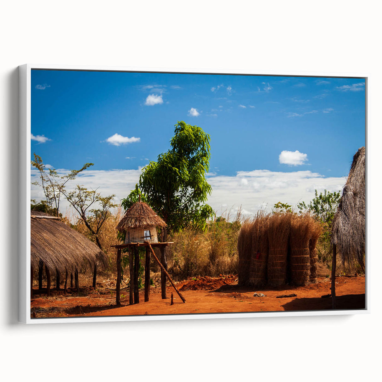 Vintage poster art of an African landscape in vibrant colors on a large framed canvas, suitable for living room decor.