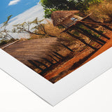 Art deco poster of a Zambian landscape on rolled canvas, featuring earthy tones, ideal for dining room wall art.