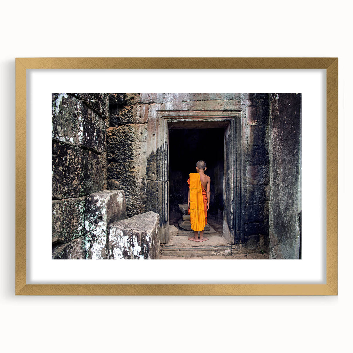 Extra large abstract art print depicting a textured Cambodian landscape in muted earth tones, framed in gold.