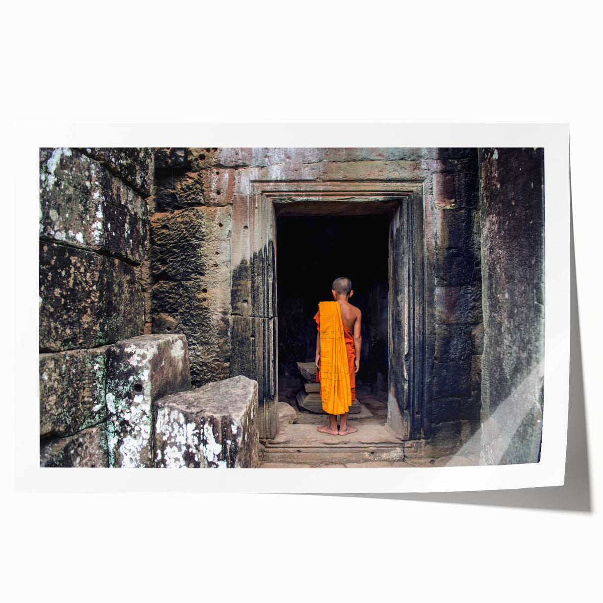 Rolled print of a Cambodian landscape with lush greenery and temples, in earth tones, suitable for dining room decor.