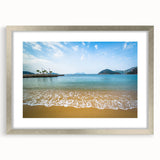 Textured abstract art print of Hong Kong skyline in muted gray and blue tones, framed with a silver mat.