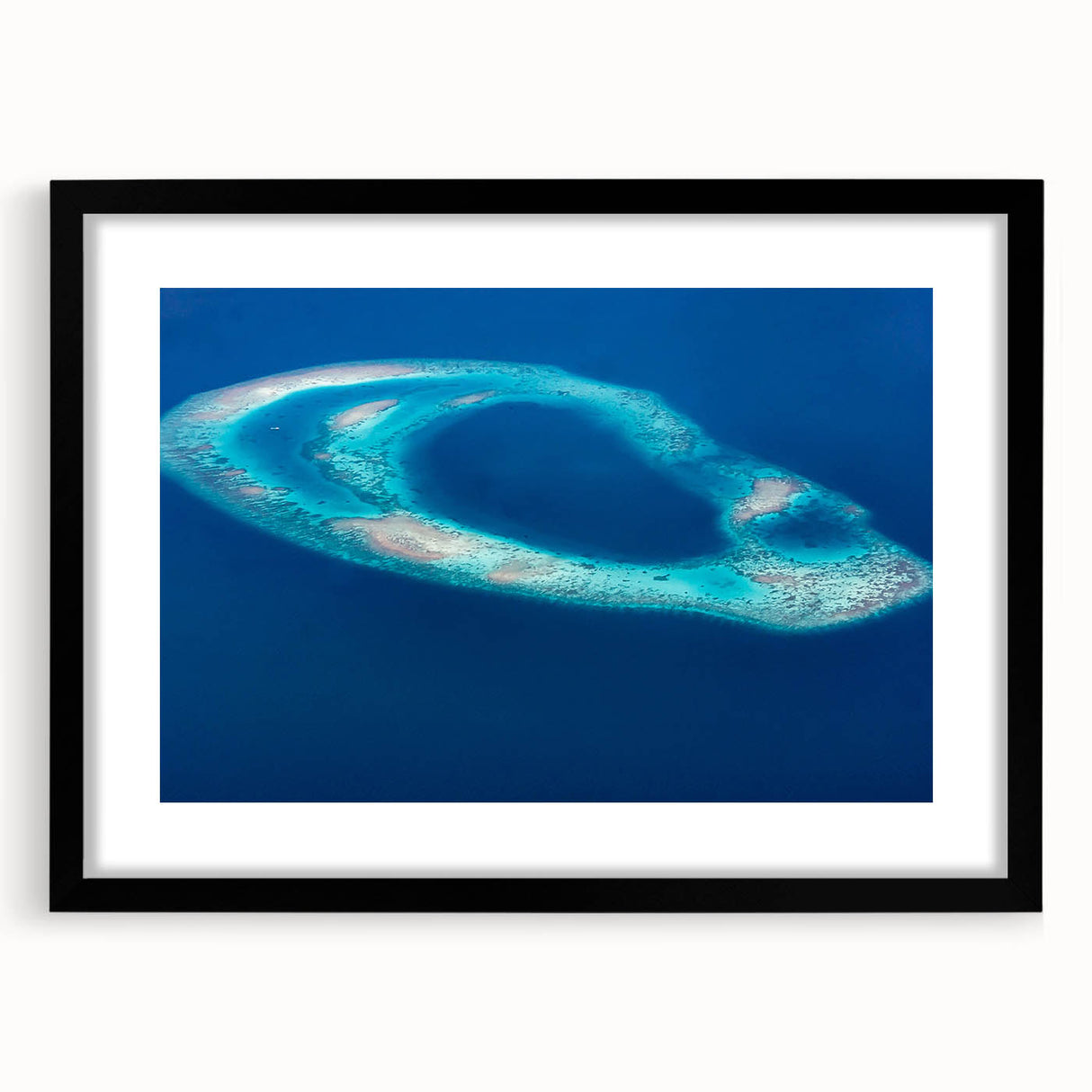 Extra large abstract art print of Maldives scenery in vibrant colors on textured canvas, framed in black.