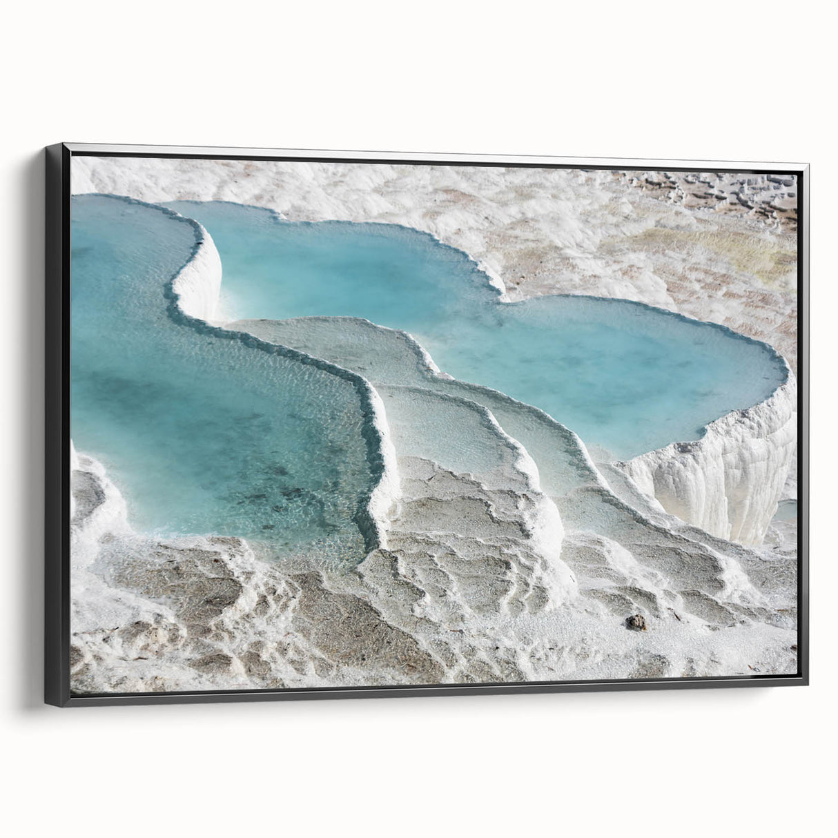 Black and white wall art featuring a vintage poster of a Turkish landscape on framed canvas, suitable for bedroom decor.