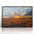 Large abstract wall art of Ayers Rock in muted earth tones, framed in black acrylic, suitable for modern living room decor.