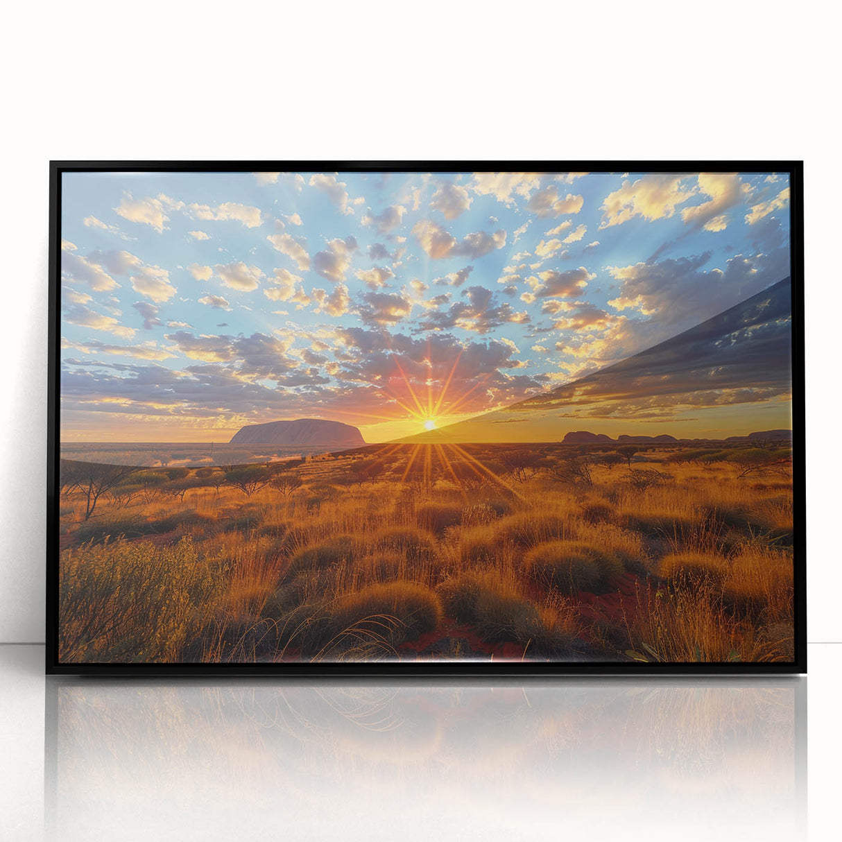 Large abstract wall art of Ayers Rock in muted earth tones, framed in black acrylic, suitable for modern living room decor.