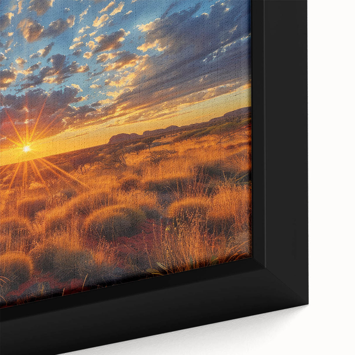 Framed canvas of Ayers Rock in Australia, featuring textured black and colorful art.