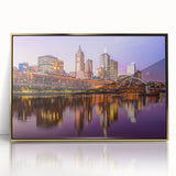 Mid-century modernist art depicting Melbourne skyline in muted gold tones on a framed acrylic.