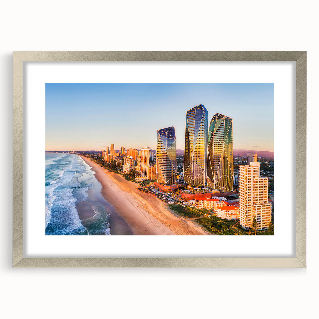 Extra large abstract art print of Queensland scenery in muted earth tones on a textured canvas, framed in silver.