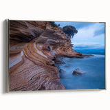 Framed canvas depicting a serene Tasmanian landscape in muted earth tones, ideal for bedroom wall art.