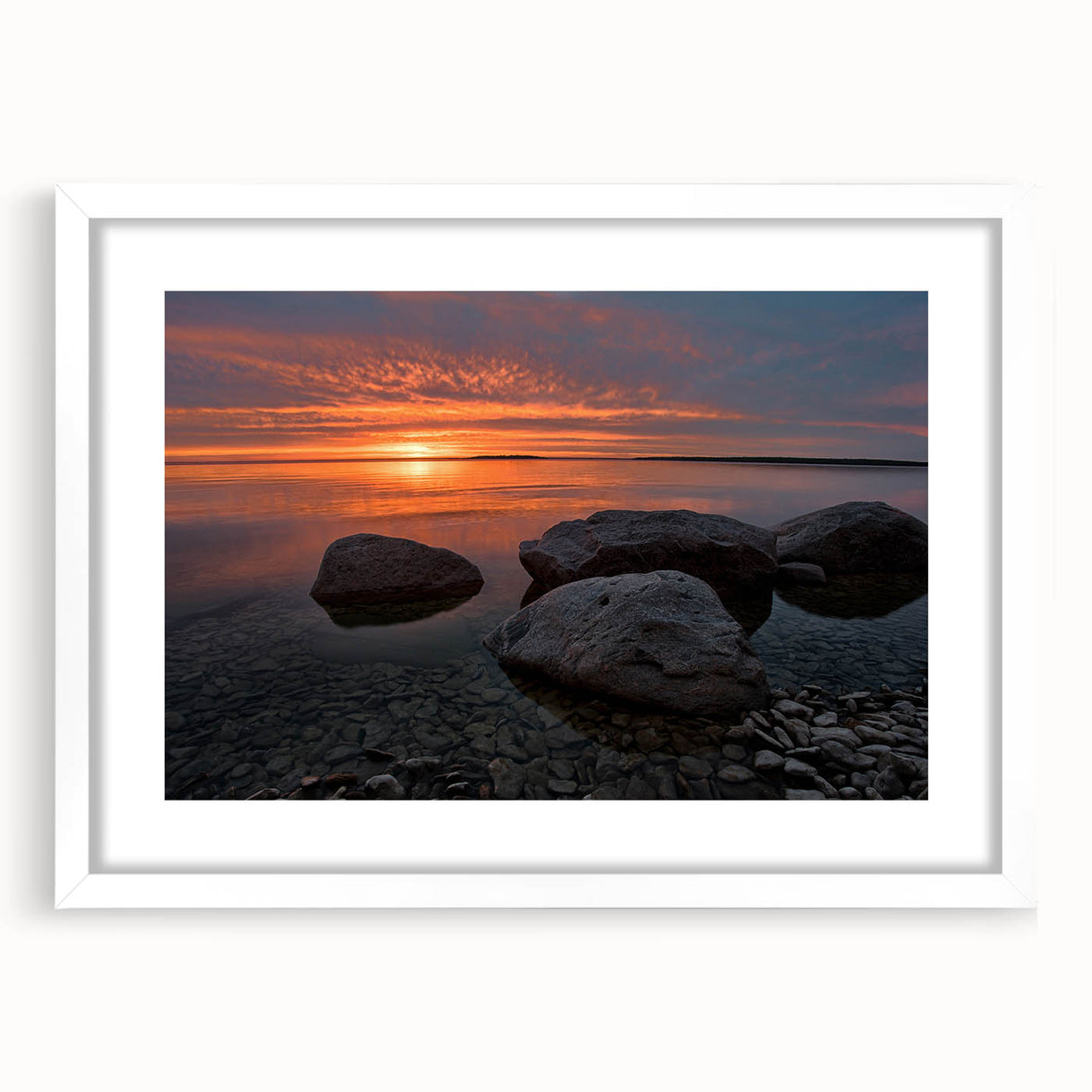 Abstract art print depicting a serene Manitoba landscape in muted green and blue tones, framed with a white mat.