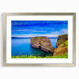 Textured abstract art print of Newfoundland scenery in muted earth tones, framed in silver, suitable for bedroom decor.