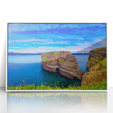 Acrylic print of a Newfoundland scenery in muted earth tones, framed in white, suitable for modern nursery decor.