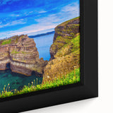 Framed canvas of a textured Newfoundland scenery in black with colorful art accents, suitable for large living room walls.