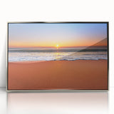 Large acrylic print of a Caribbean seascape in muted blue and green tones, framed in silver.