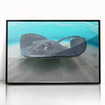 Large abstract wall art featuring a Caribbean seascape in vibrant blue tones on a framed acrylic.