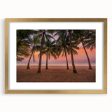 Abstract art print of a Caribbean scene in muted blue and green tones on a framed gold mat.