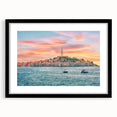 Abstract art print of a vibrant Croatian landscape in textured colors, framed in black, ideal for living room decor.