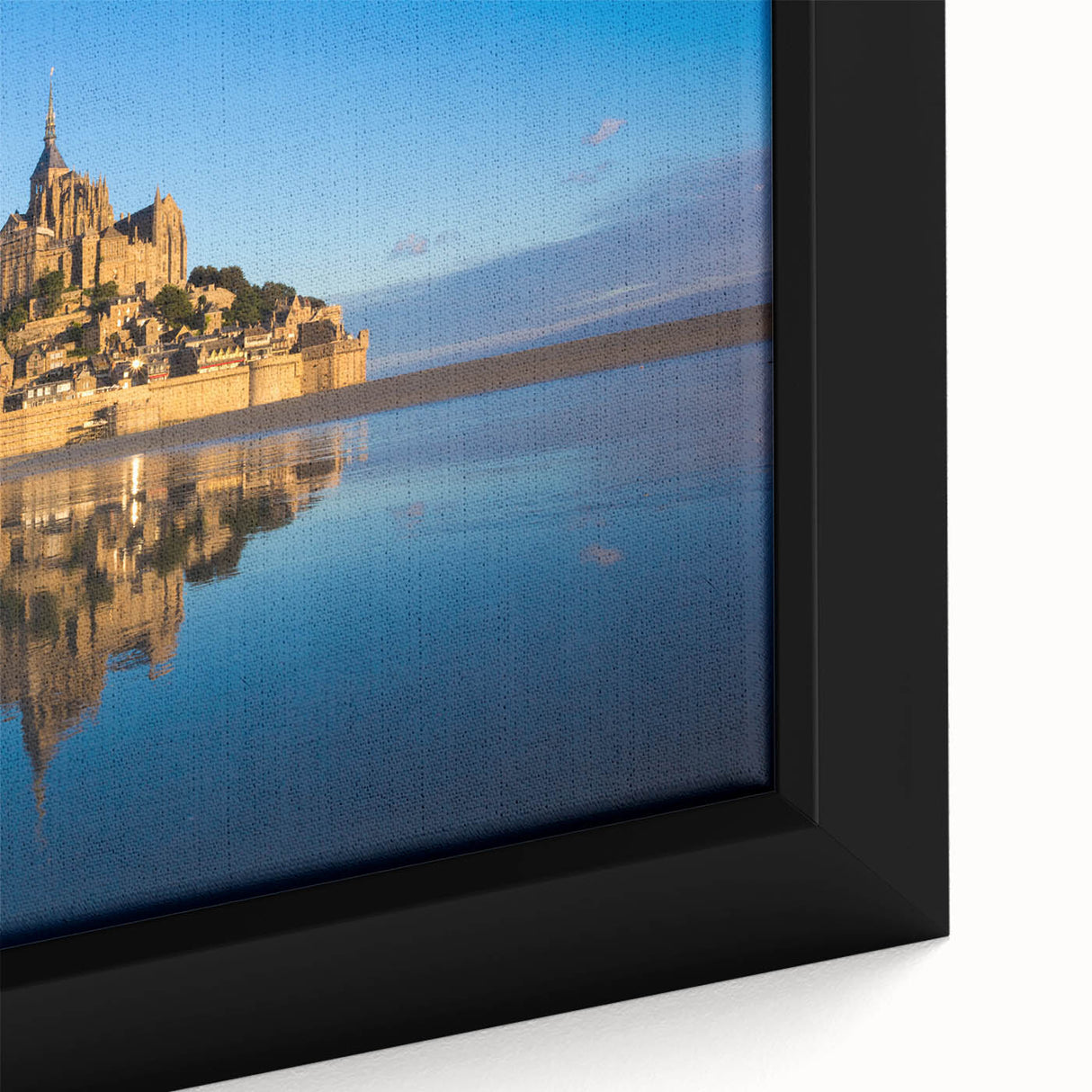 Close-up of textured black wall art depicting a scenic French landscape on a framed canvas, ideal for living room decor.