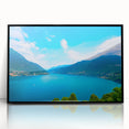 Large abstract wall art of Lake Como with vivid blue and green tones, framed in black acrylic.