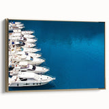 Framed canvas featuring a vintage-style landscape painting of Monaco, with muted gold and black tones.