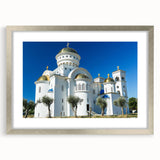 Extra large abstract art print depicting a textured European scenery in muted earth tones, framed in silver.