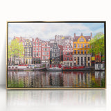 Art deco style poster of European scenery, featuring muted gold and blue tones on framed acrylic.