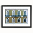 Extra large abstract art print of a colorful, textured Lisbon scenery on a framed black mat, ideal for living room decor.