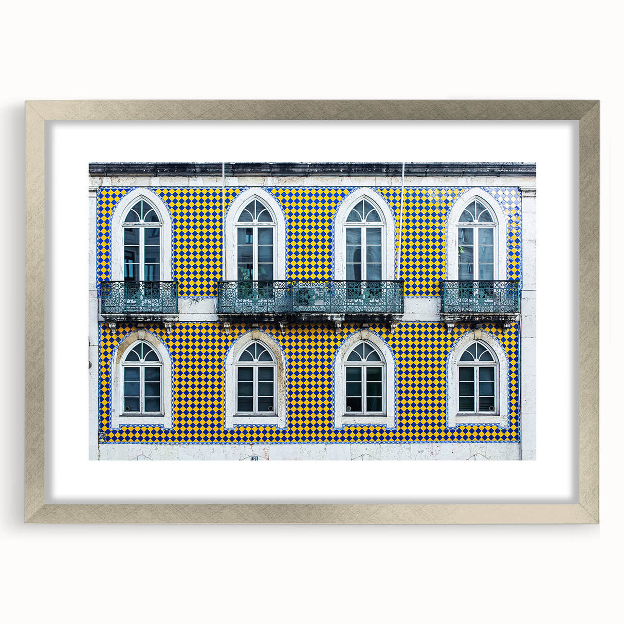 Extra large abstract art print of Lisbon scenery in silver frame, featuring textured grays and blues.