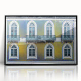 Large abstract wall art of Lisbon's skyline in muted gray and blue tones on a framed acrylic.