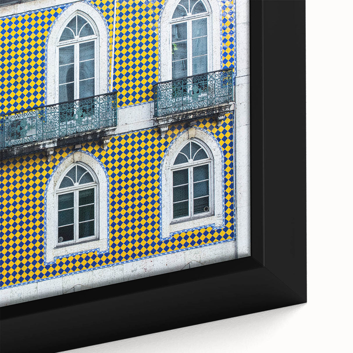 Extra large framed canvas of Lisbon scenery in black with colorful, textured accents, ideal for living room decor.