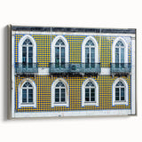 Framed canvas of Lisbon landscape featuring colorful vintage poster art on a black background, ideal for living room decor.