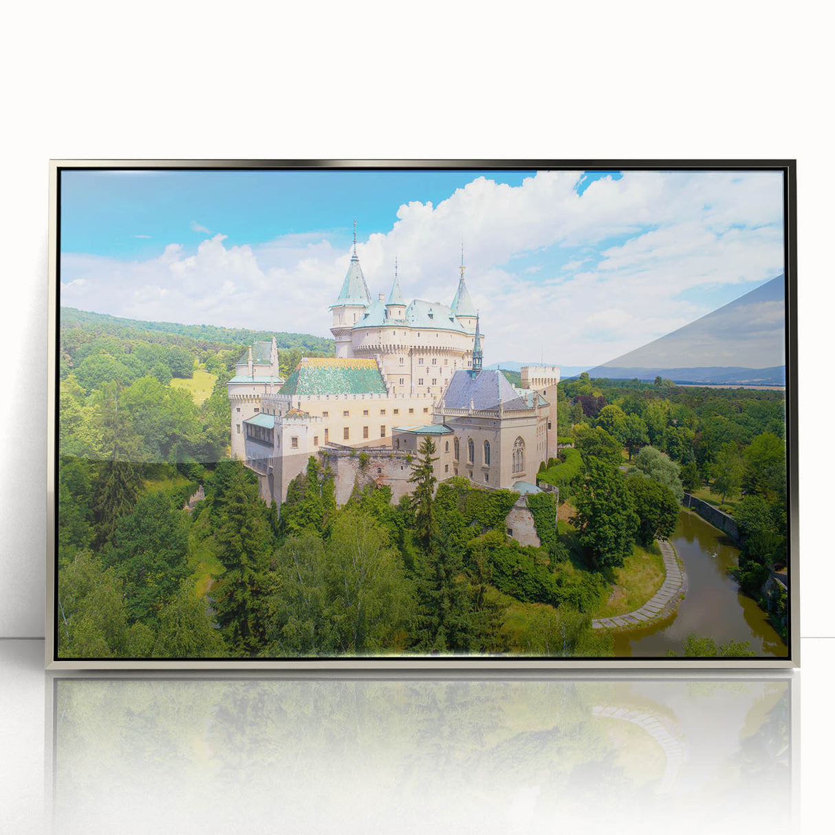 Large art print of a Slovakian landscape in muted earth tones, framed in silver acrylic, suitable for modern nursery decor.