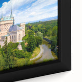 Black wall art featuring a textured, colorful European scenery on a framed canvas, ideal for living room decor.
