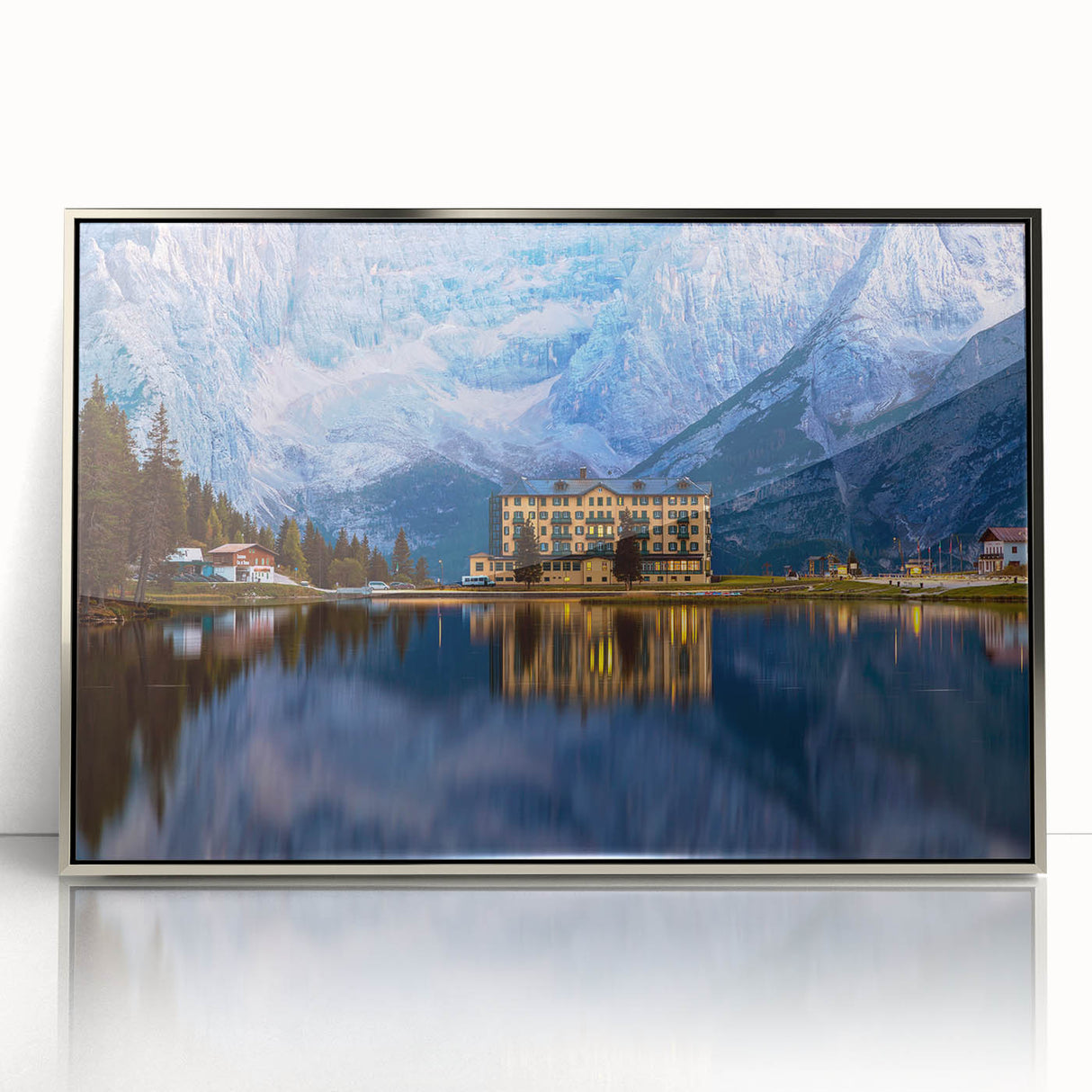 Art deco poster depicting a serene Slovenian landscape in muted earth tones, framed in silver acrylic.