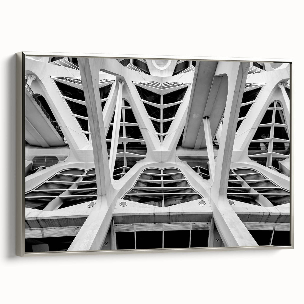 Framed canvas featuring a vintage-style landscape painting of Valencia, with muted earth tones and pops of blue.