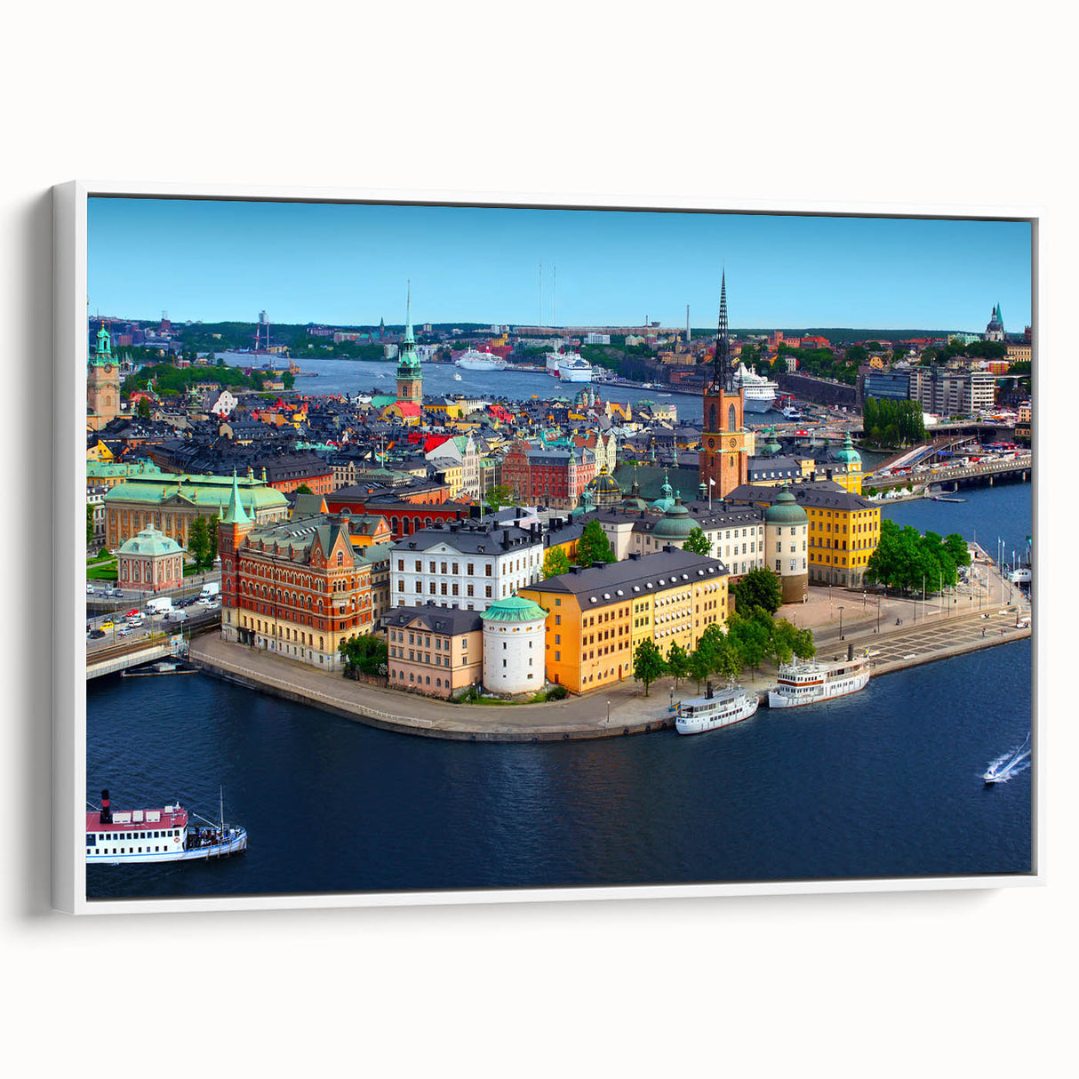 Vintage poster art of a European landscape on a large framed canvas, featuring vibrant color contrasts.