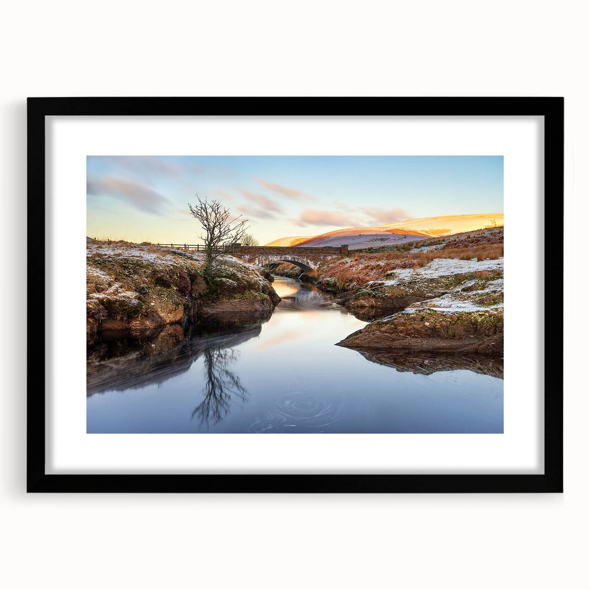 Abstract art print of a vibrant European landscape in a black frame, ideal for living room decor.