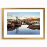 Extra large abstract art print of a Welsh landscape in muted green and brown tones on a framed canvas.