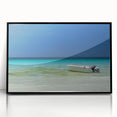 Large abstract wall art featuring a Cancun scenery in muted blue and green acrylic, framed in black.