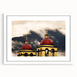 Abstract art print of Oaxaca scenery in muted earth tones, framed with a white mat, suitable for dining room decor.