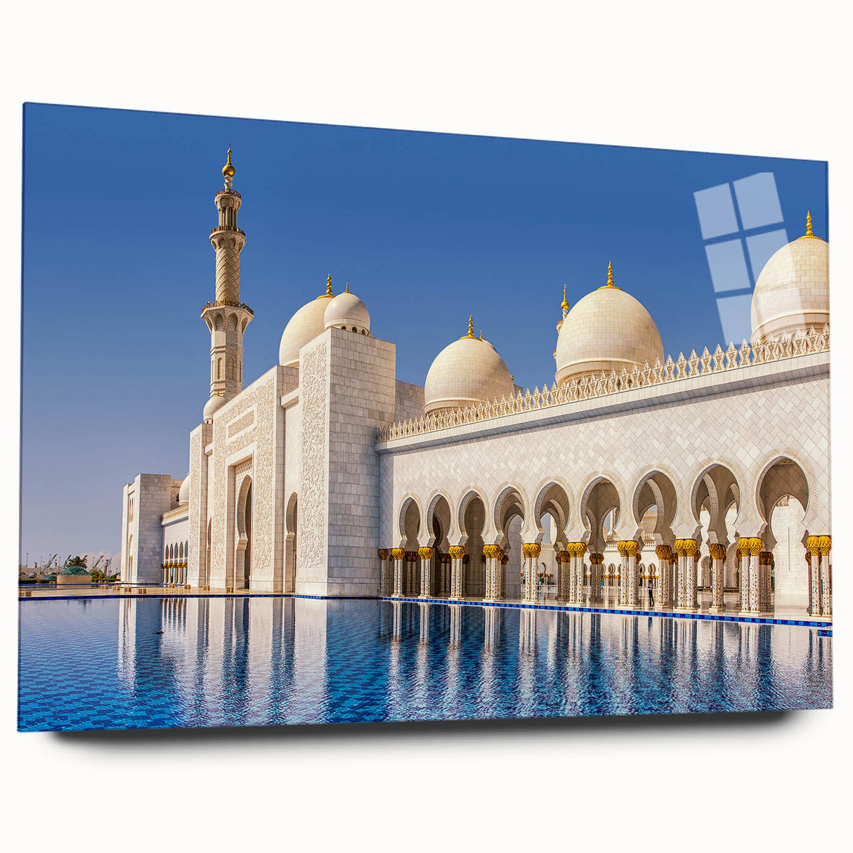 Large abstract wall art of Abu Dhabi skyline in muted blue and gray tones on acrylic glass.