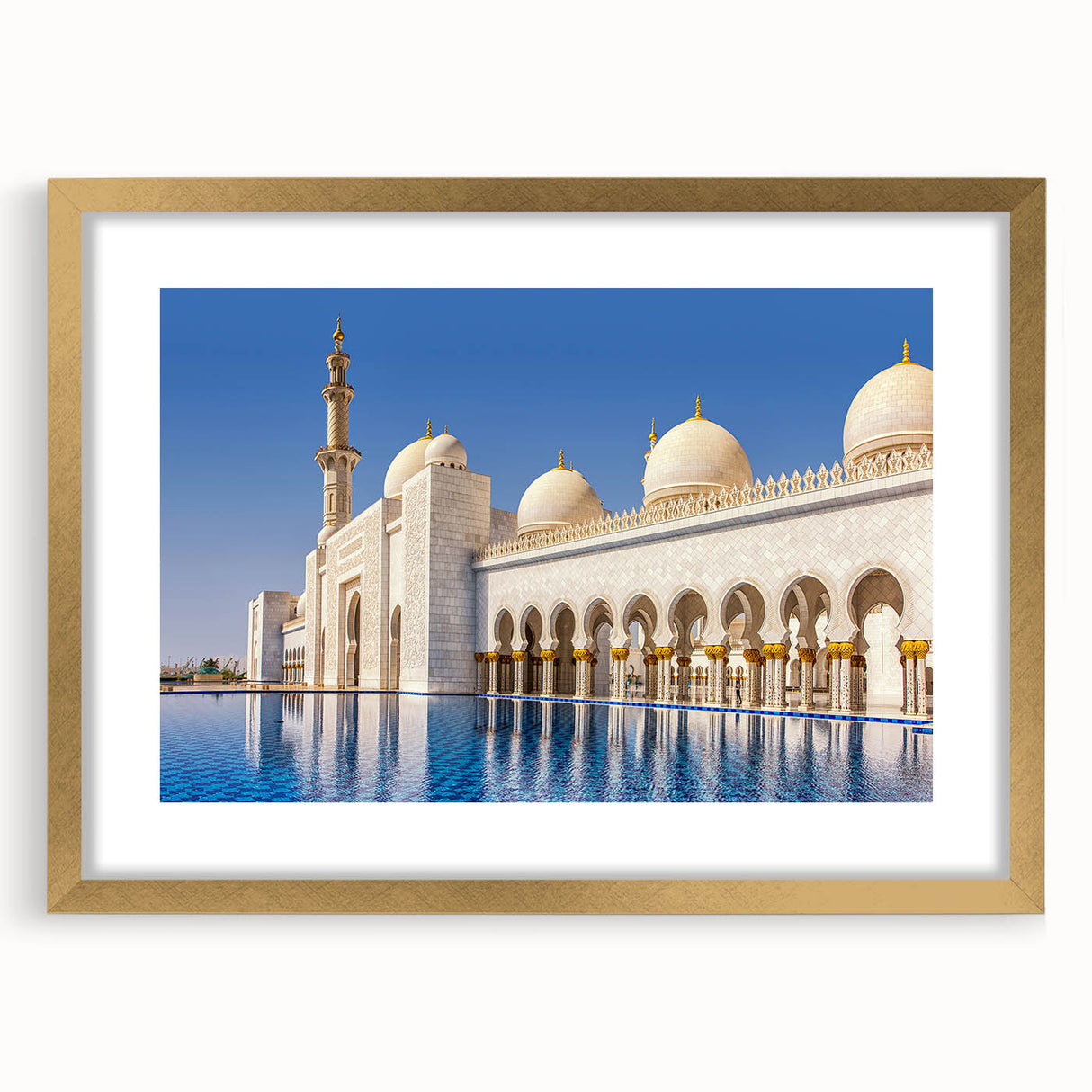 Extra large wall art featuring an abstract textured print of the Abu Dhabi skyline in muted gold and blue tones.
