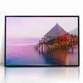 Large abstract wall art featuring the serene Tahiti coastline in muted blue and green tones, framed in black acrylic.